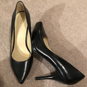 Black pointy toe pumps